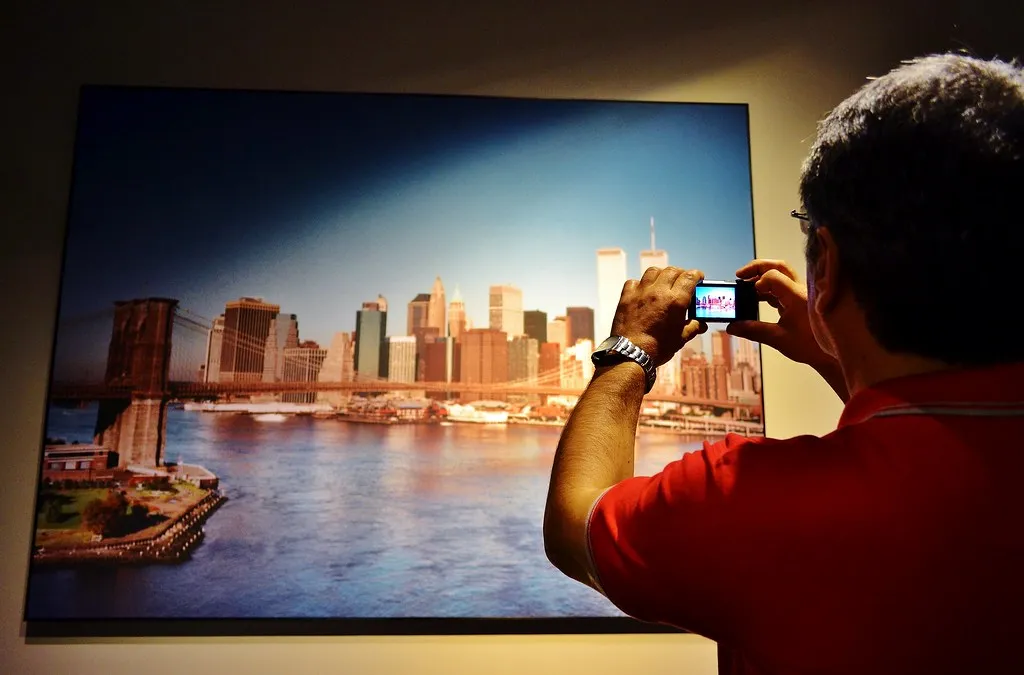 a man clicking photograph inside 911 museum